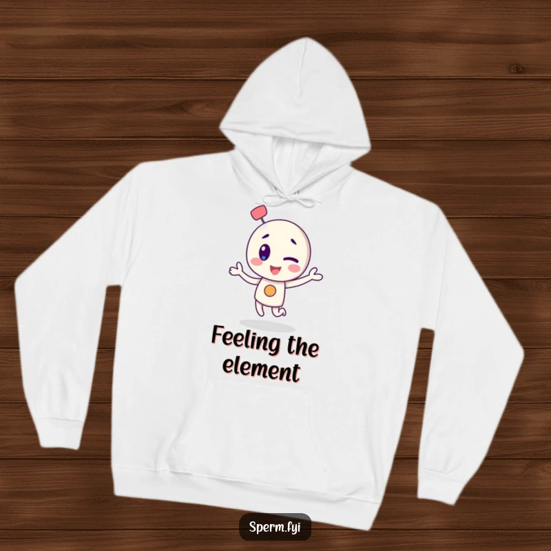 Funny hoodie depicting a winking atom character in a lively dance, perfect for cozy science enthusiasts.