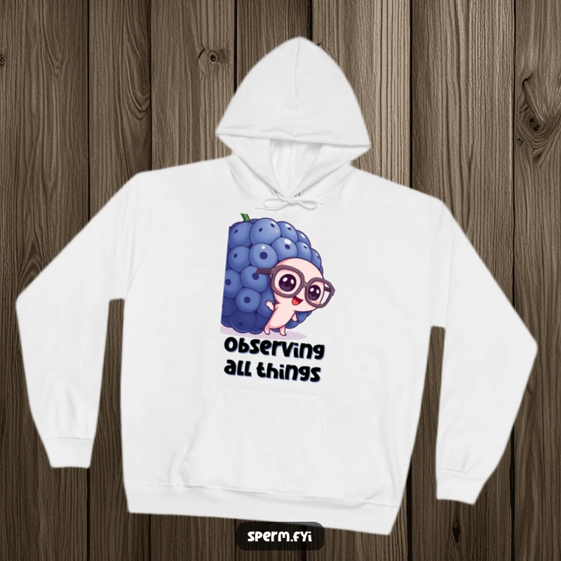 Funny sperm hoodie, wearing large glasses, peeking from behind a huge blueberry, cozy humor.